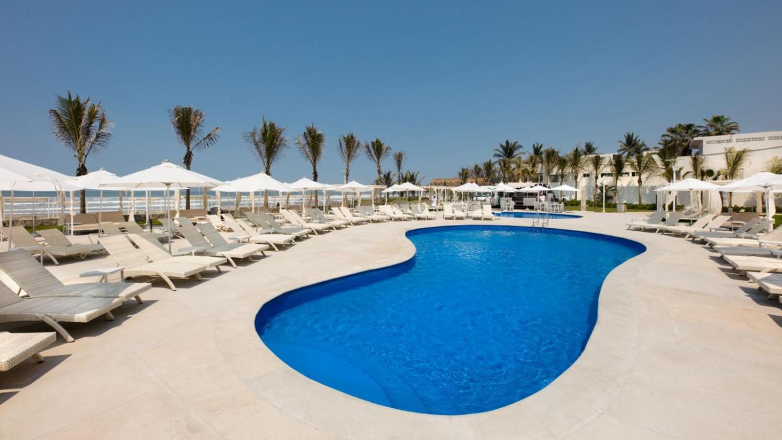 Palacio Mundo Imperial Riviera Diamante Ακαπούλκο Εξωτερικό φωτογραφία The swimming pool at the Iberostar Grand Hotel
